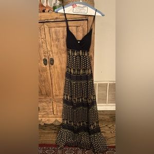 Maxi, printed dress with lining and spaghetti straps. Size Small, women’s